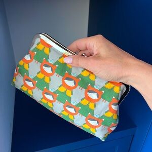 Clutch purse with adorable design. 10Wx6H inches. 100% cotton fabric.